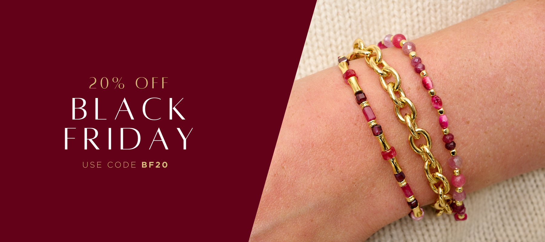 Red garnet beaded bracelet styled with chunky gold chain bracelet with a cream knitted jumper for Black Friday Sale