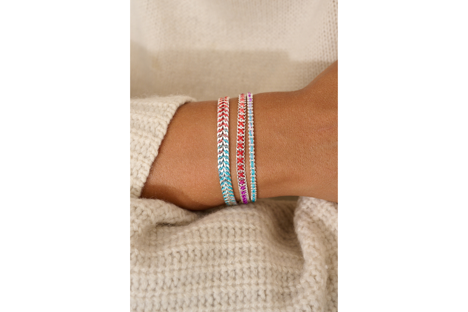 Braid Moroccan Spice Silver Woven Bracelet featured on stacked wrist with other Boho Betty bracelets