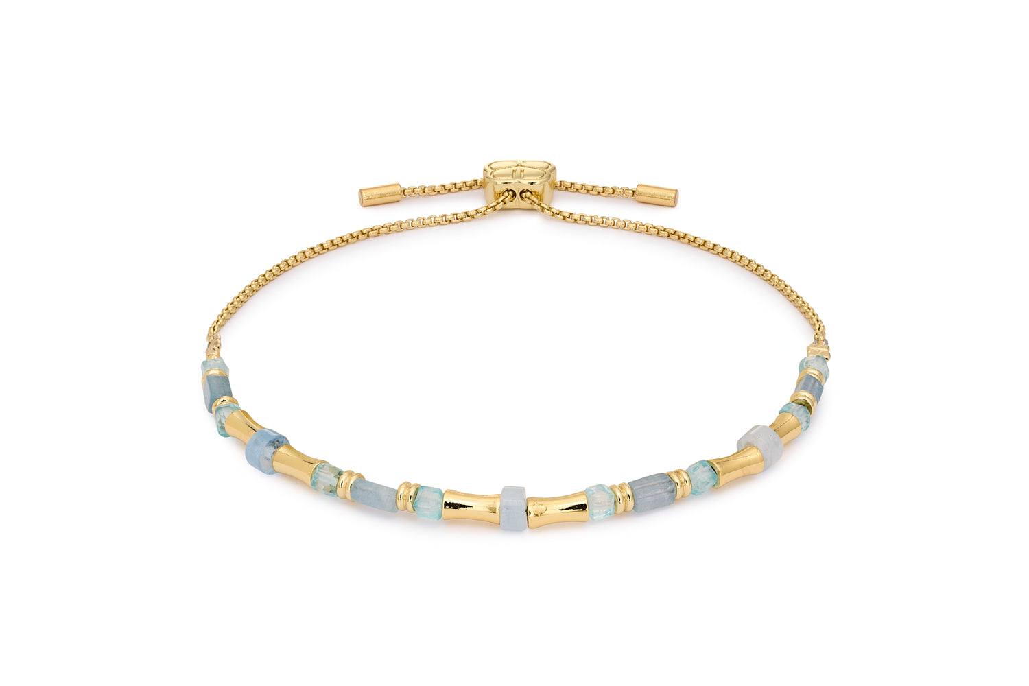 Chiara Gold & Blue Topaz Bead Slider Bracelet with faceted pale blue gemstones and 12k gold-plated tube beads in an adjustable slider design.