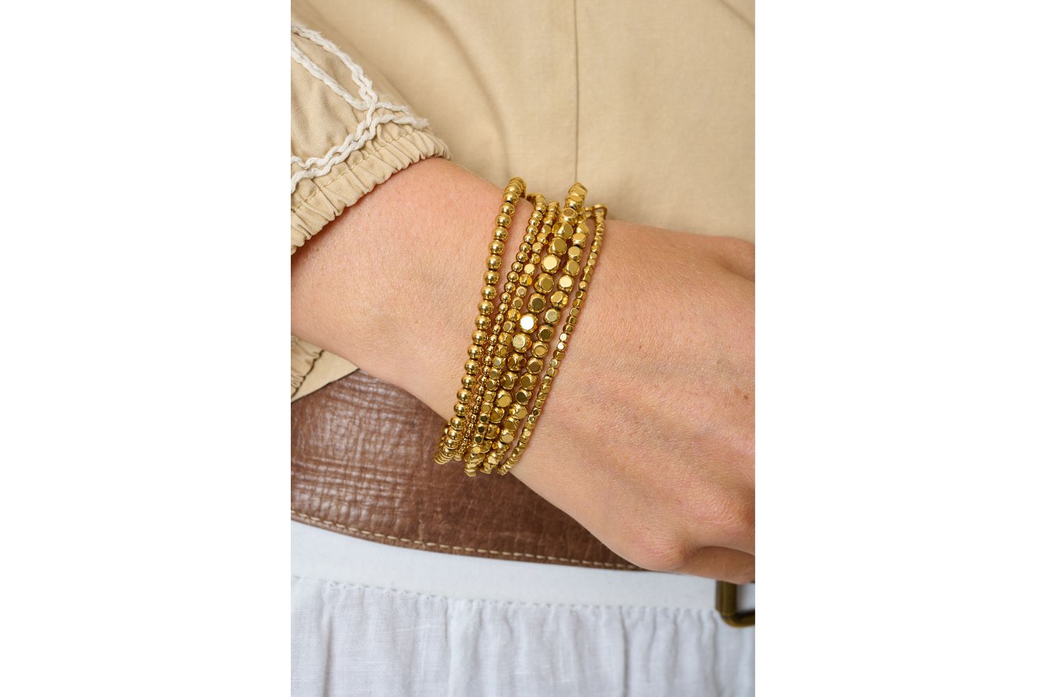 Eleora Gold Bracelet Stack styled for sun-drenched days and relaxed glamour, a perfect gift-ready bracelet set for holidays or everyday luxury.