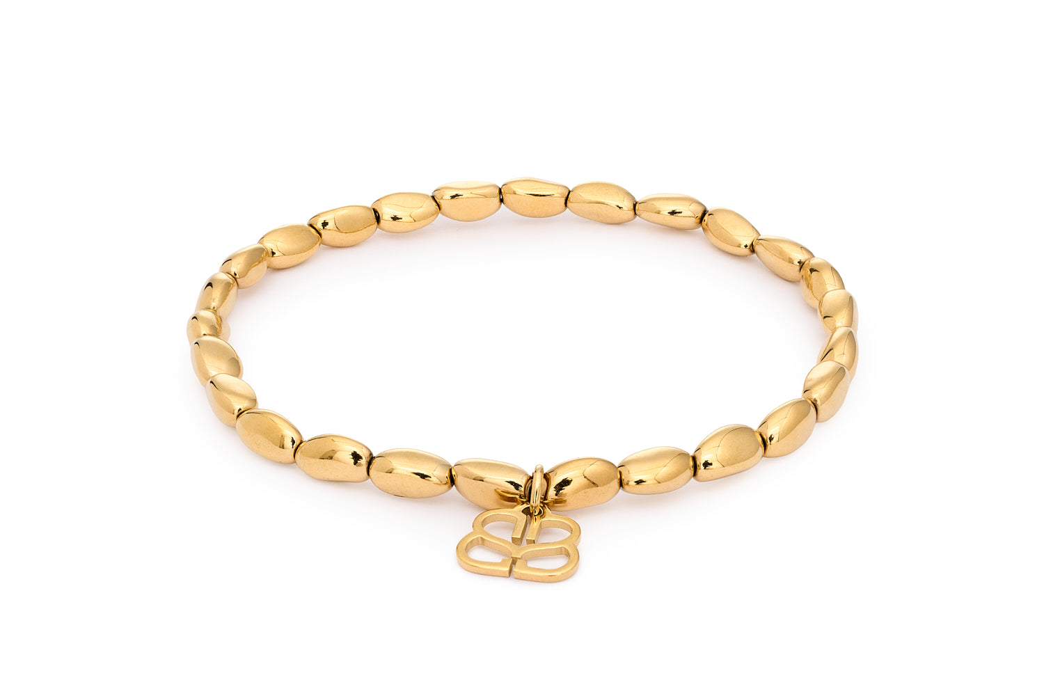 Flavia Gold Stretch Bead Bracelet featuring polished pebble-shaped 14k PVD gold-plated stainless steel beads with Boho Betty filigree charm in a stretch-fit design.