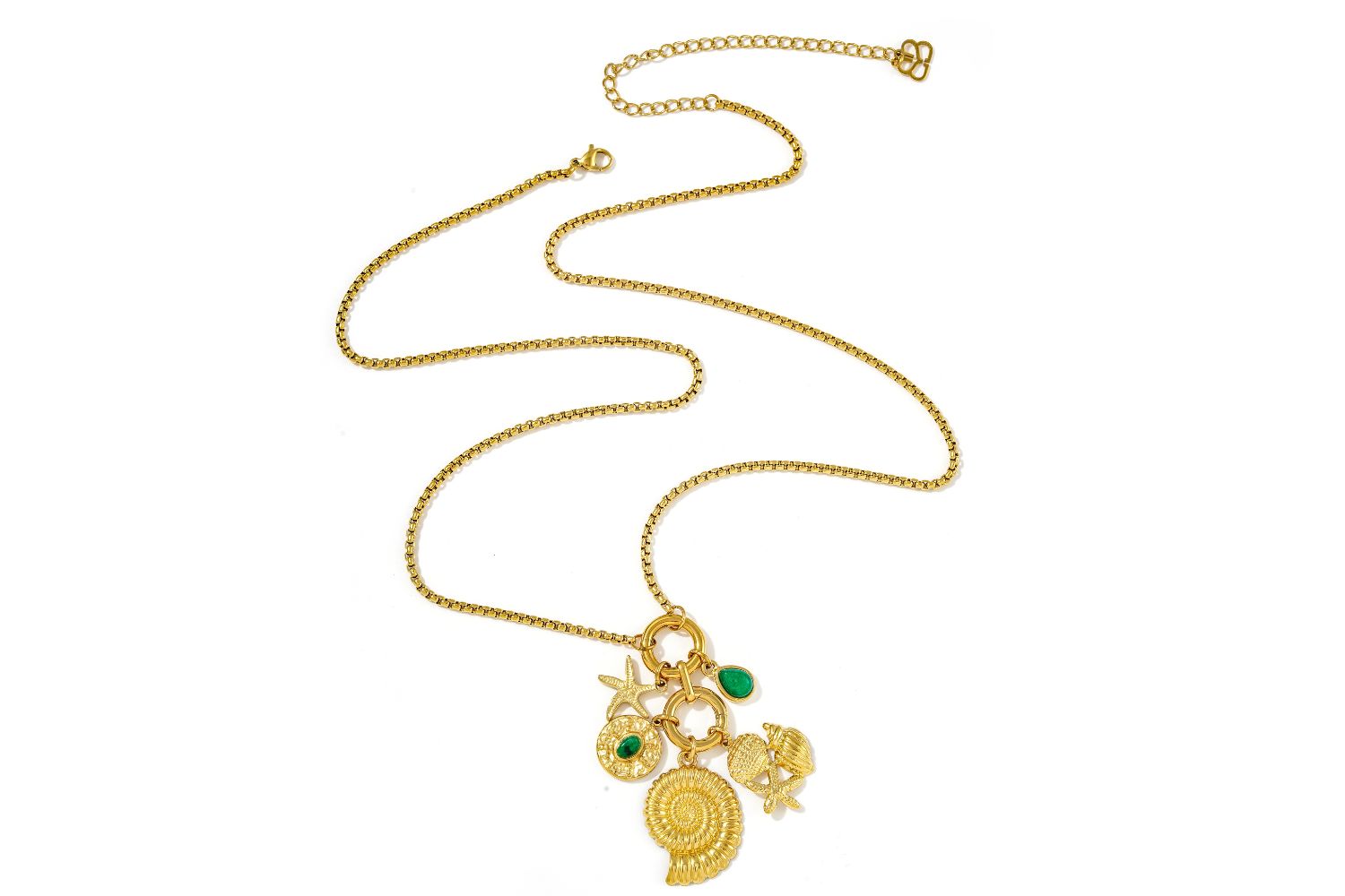 Hemani Gold & Green Agate Long Charm Pendant Necklace styled with flowing fabrics and layered boho beach jewelry.