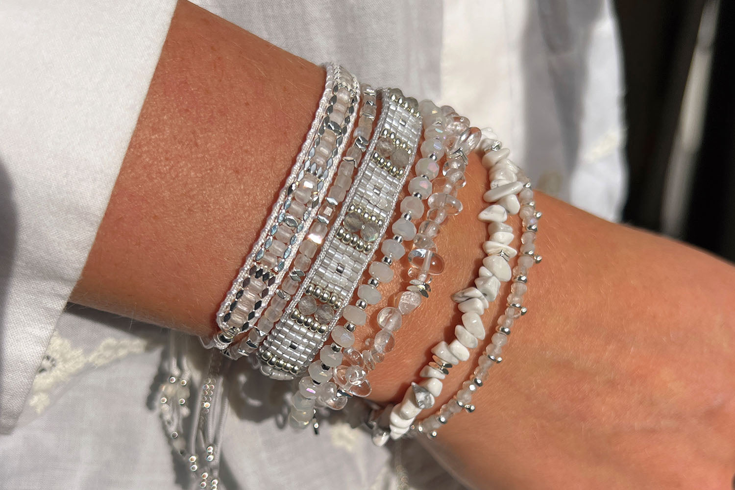 Leilie Labradorite & Silver Beaded Friendship Bracelet styled on the wrist, showcasing its cosmic-inspired tones, silver accents, and effortlessly chic boho-luxe design.