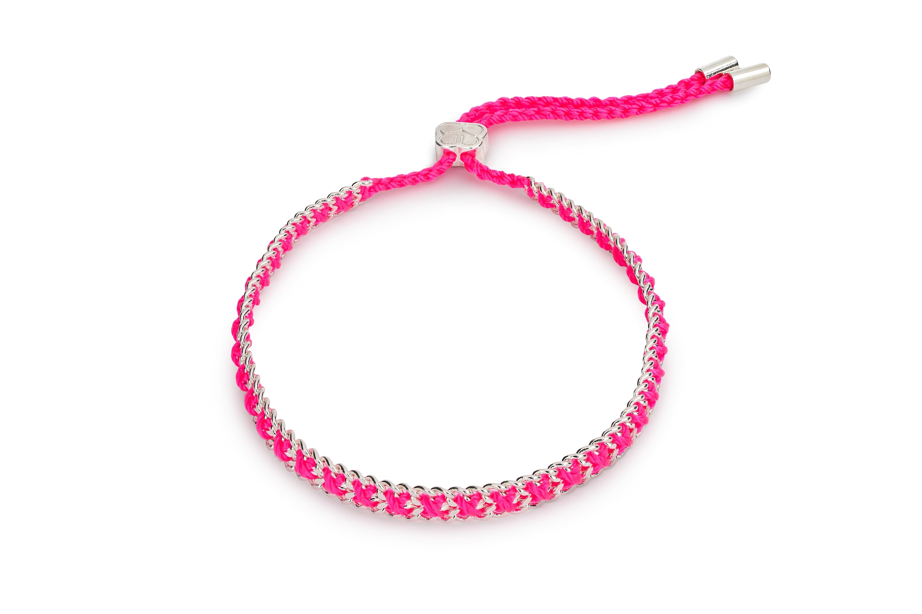 Lilia Hot Pink Silver Woven Bracelet featuring vivid hot pink braided thread woven through a polished silver chain with an adjustable slider fastening.