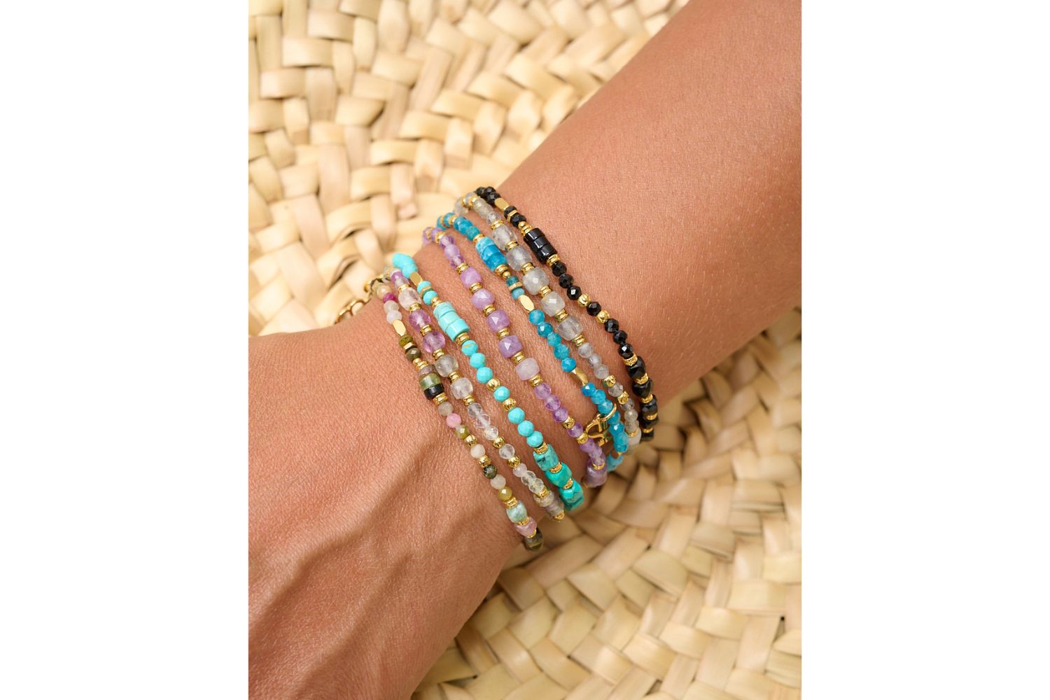 Yasmin gold and amethyst mix gemstone bracelet featured on wrist with Boho Betty stacking bracelets