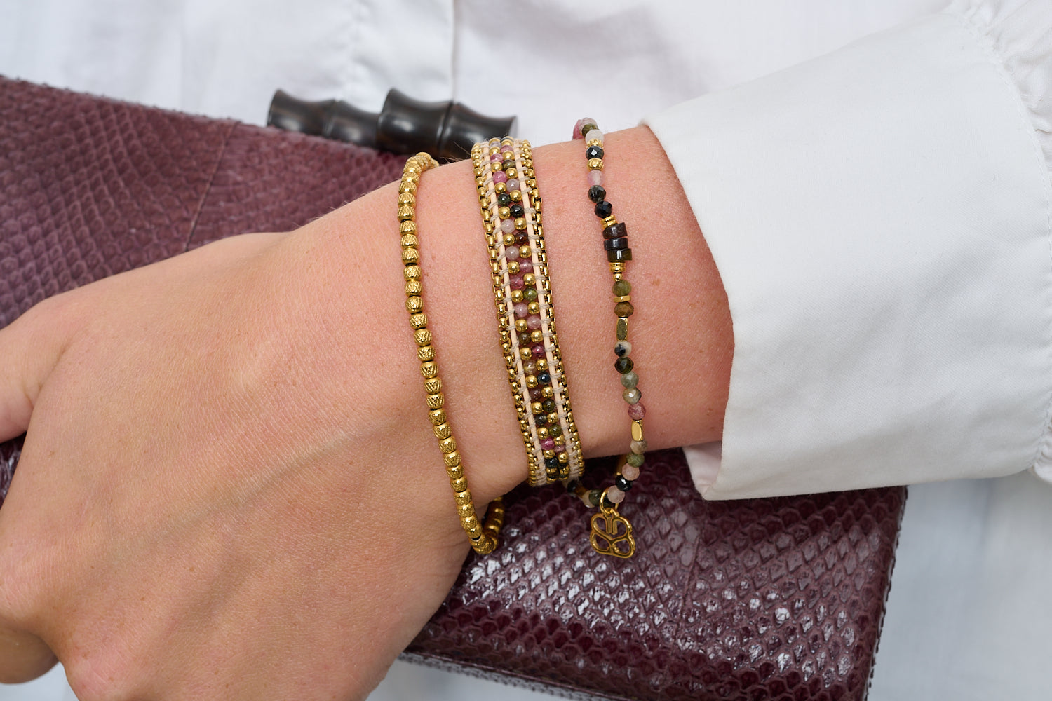 Yasmin tourmaline gemstone bracelet styled on wrist with Boho Betty stacking bracelets.