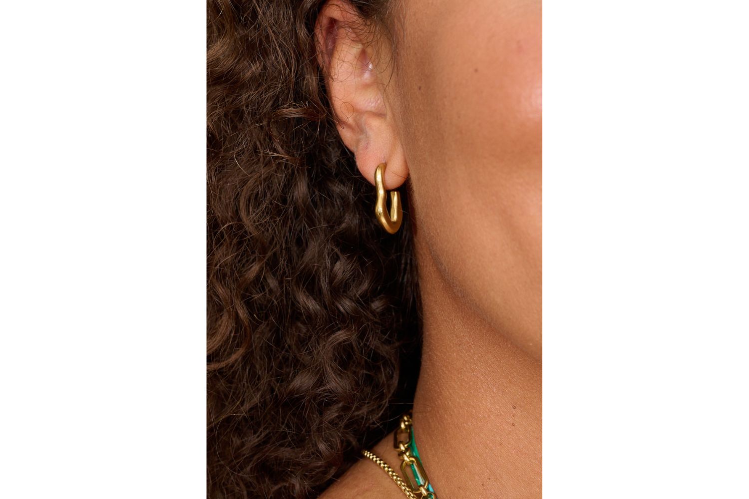 Savina earrings shown on the model as part of the Boho Betty jewelry set