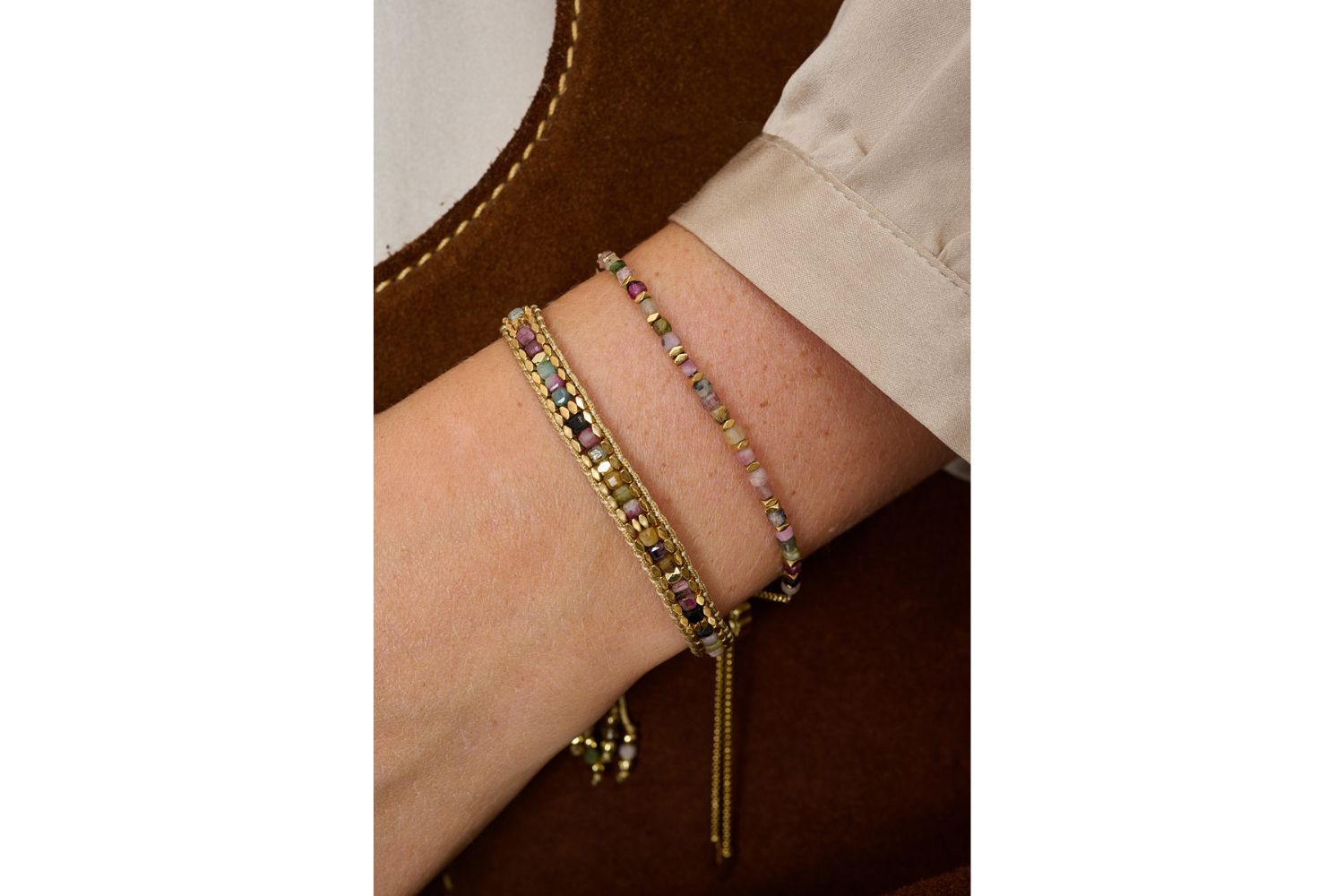 Anastasia Gold & Tourmaline Beaded Bracelet styled on the wrist, showcasing colourful tourmaline gemstones and polished gold PVD details for everyday boho styling.