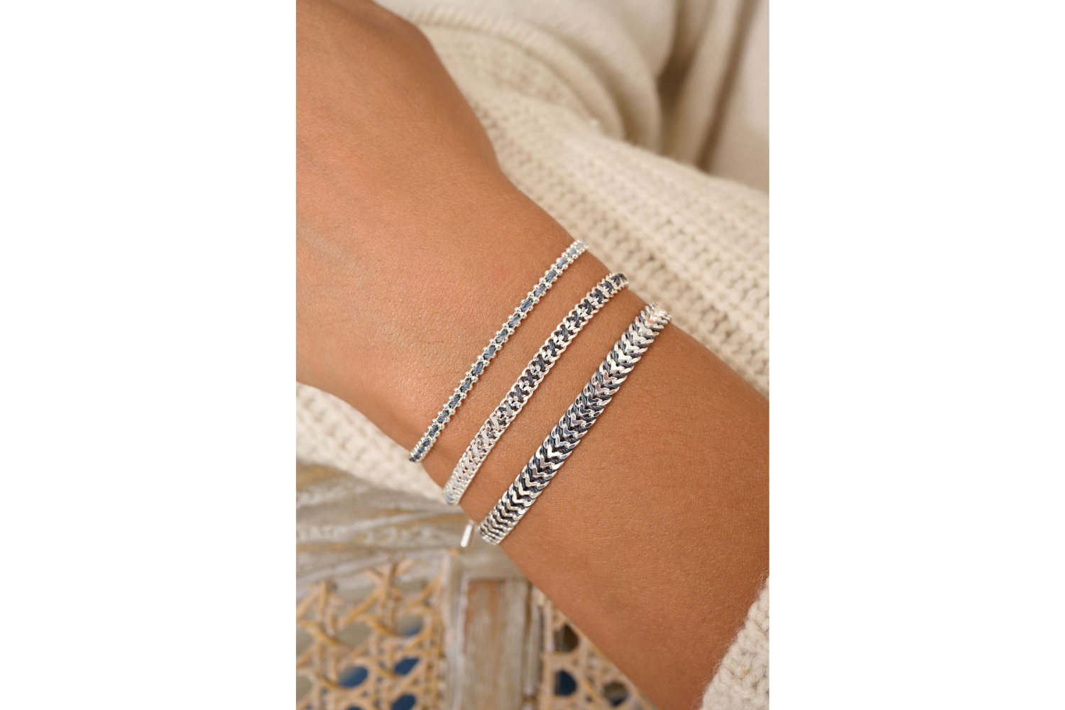 Braid charcoal and silver bracelet featured on wrist with Boho Betty stacking bracelets