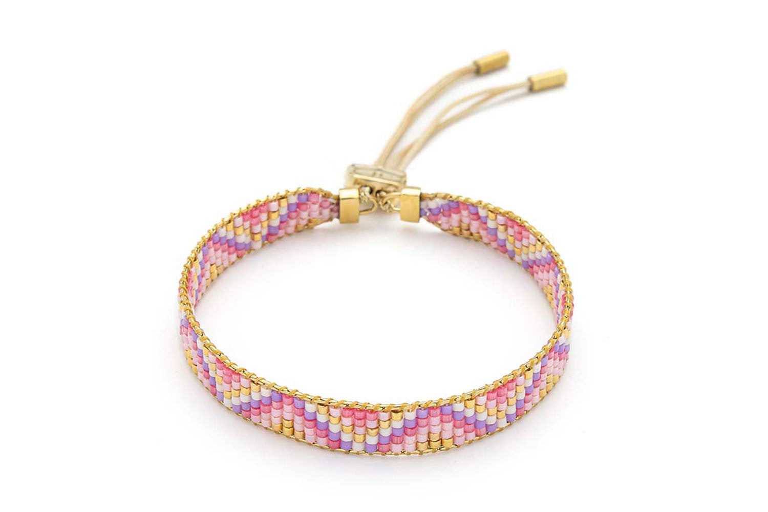 Claudia Pink Gold Friendship Bracelet featuring handwoven Miyuki beads in soft pink, lilac, and gold, finished with a 12k gold-plated adjustable slider fastening.
