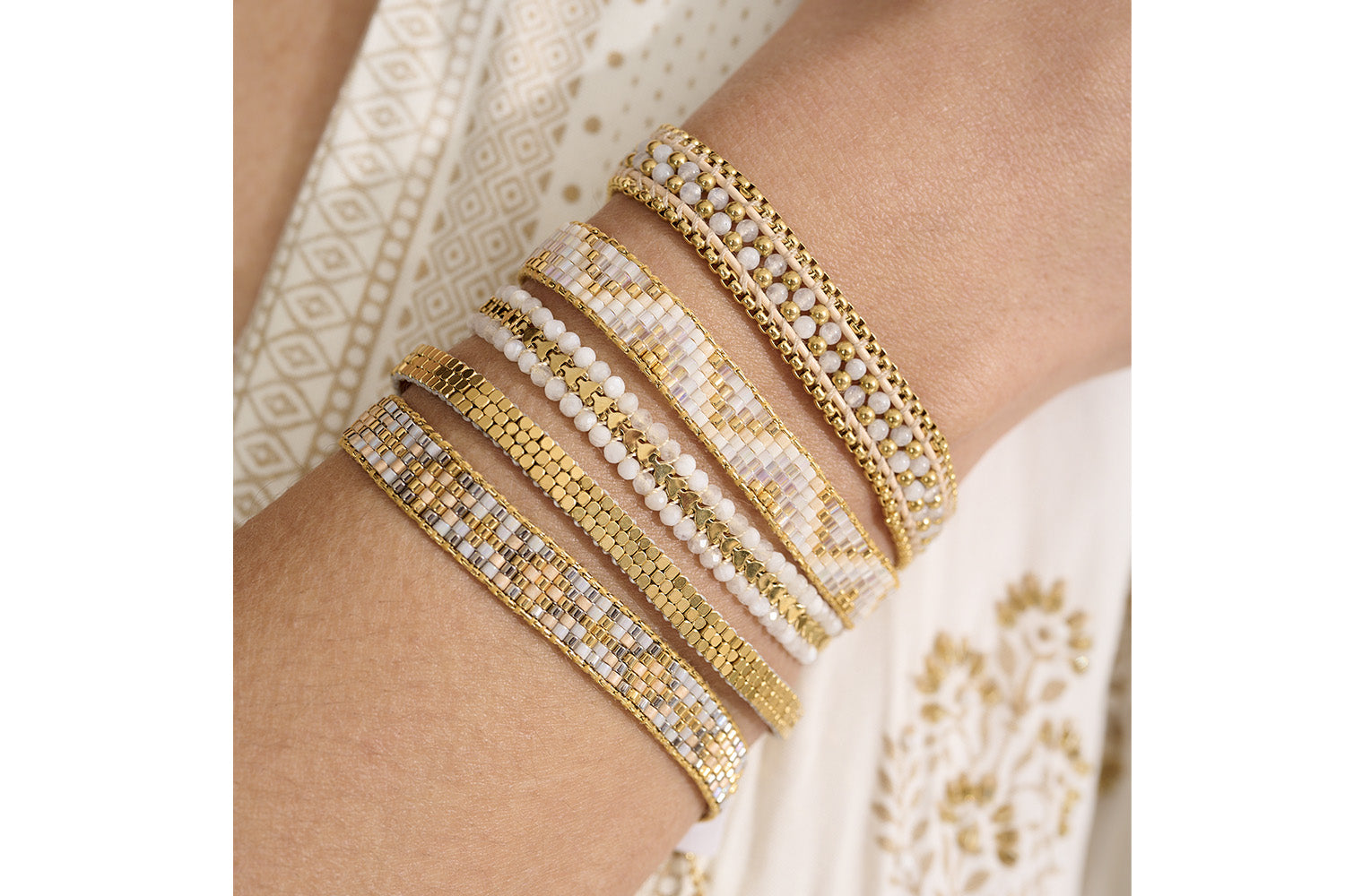 Daiko Gold Braided Bracelet styled on the wrist, catching the light with gold beaded detailing, perfect for layering or wearing solo.