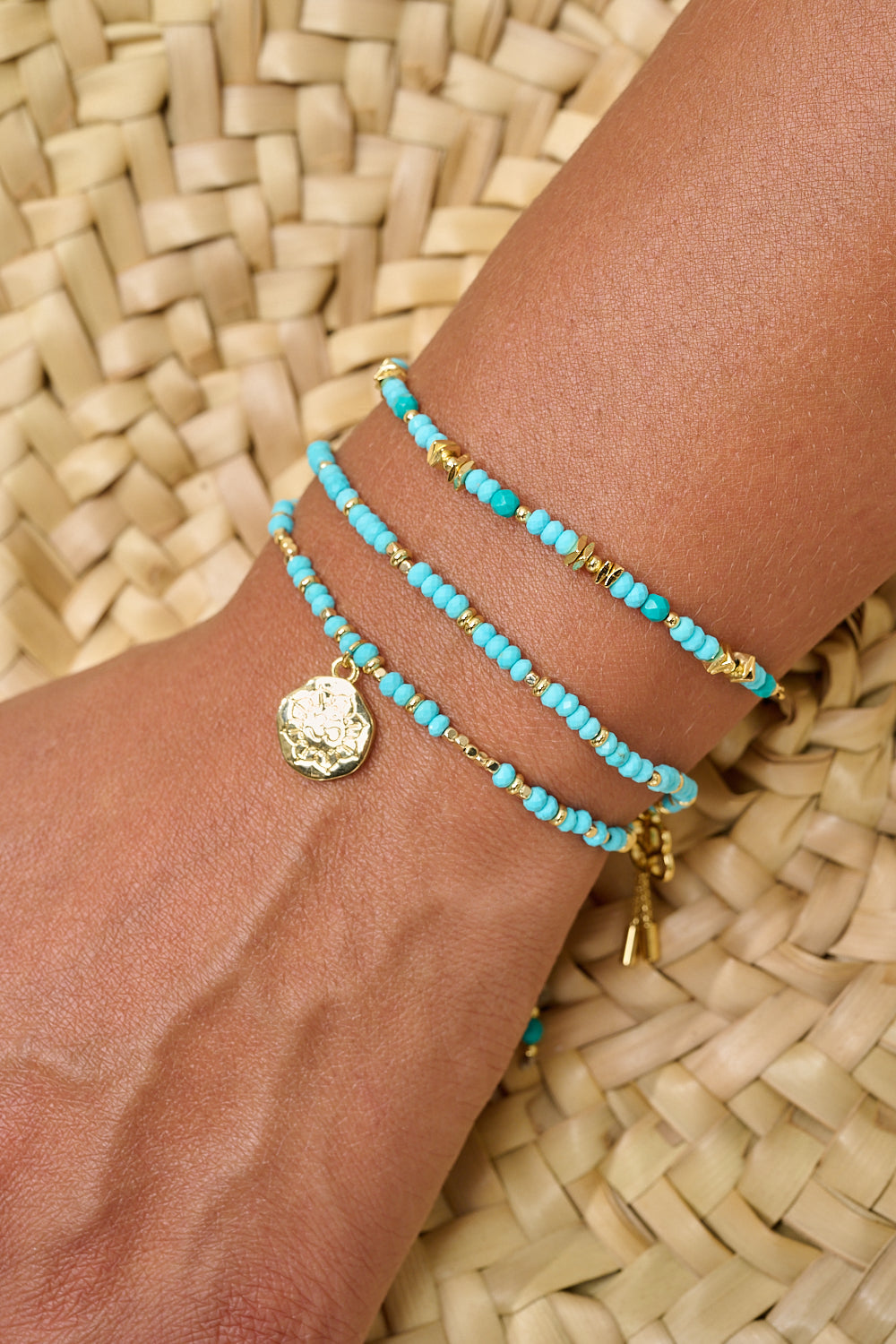 Dash turquoise howlite bracelet featured on wrist with Boho Betty gold bracelet stack