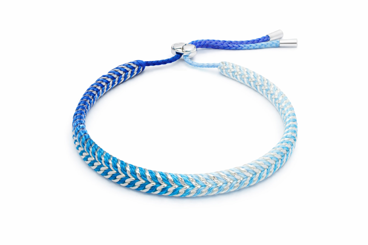 Iztac Midnight Silver braided bracelet in ombré blue shades  with silver accents on white background