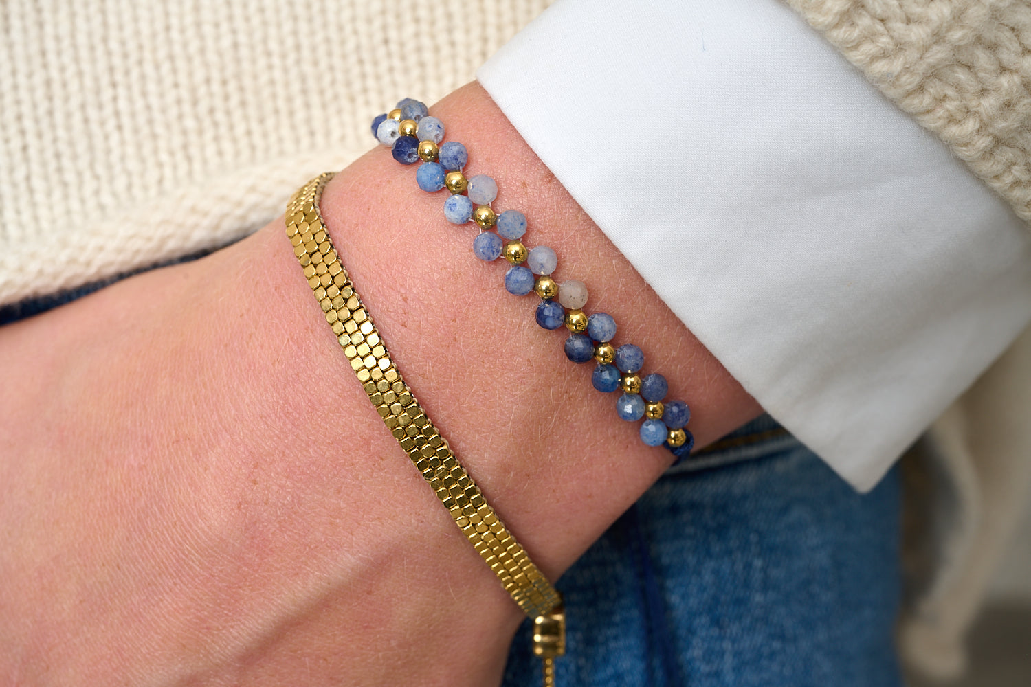 Marisol Gold & Blue Aventurine Gemstone Bracelet styled on the wrist with layered Boho Betty gold and blue gemstone bracelets.