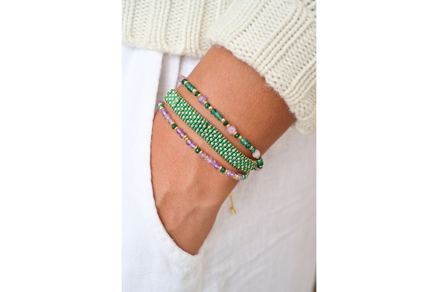 Samoa green and purple gold bracelet stack featured on wrist with Boho Betty stacking bracelets