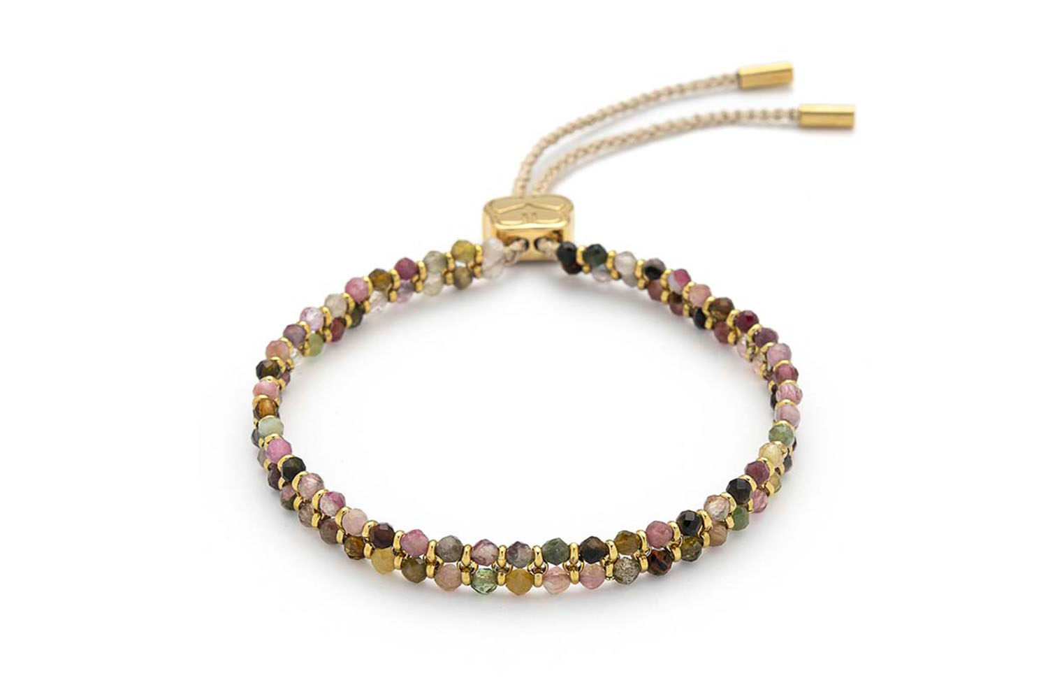 Talia Rainbow Tourmaline Gold Bracelet featuring natural rainbow tourmaline beads, 12k gold-plated accents, and an adjustable slider fastening.