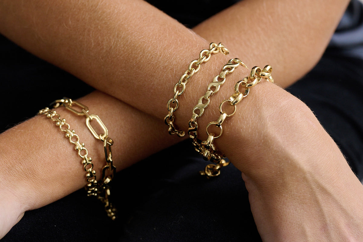 Crisos Gold Chain Bracelet stacked with chunky gold bracelets - Boho Betty